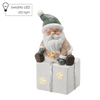 FIGURINE OF THE NATIVITY SCENE - SANTA SITTING ON A PRESENT 22,5 X 18 X 43,5 CM LED 