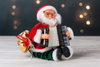 SANTA CLAUS WITH ACCORDION - PLAYING LED 25,5 CM