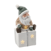 FIGURINE OF THE NATIVITY SCENE - SANTA SITTING ON A PRESENT 22,5 X 18 X 43,5 CM LED 