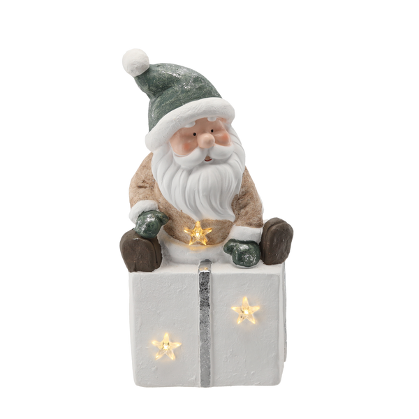 FIGURINE OF THE NATIVITY SCENE - SANTA SITTING ON A PRESENT 22,5 X 18 X 43,5 CM LED
