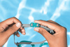 SWIM GOGGLES WITH COLORED LENSES