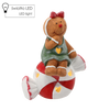 FIGURINA DE CRĂCIUN - OMUL DE ZAHĂR ȘEZÂND PE BOMBOANĂ 26,5 X 15 X 35 CM LED *0981